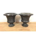 Pair of black marble campana shape urns