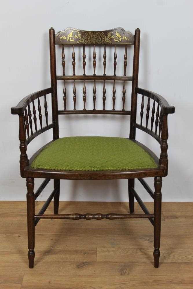 Regency rosewood and brass inlaid spindle back elbow chair