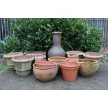 A collection of terracotta garden pots (13)
