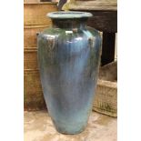 Tall and slender flambé glazed garden vase