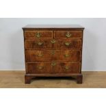 Rare George I yew and fruitwood veneered chest of two short and three long drawers with original bra