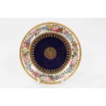 Sevres dish, finely painted with flowers around the edge, the centre with gilt patterns on a bleu la