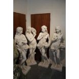 Set of four composite white painted statues representing the four seasons