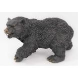 Antique bronze sculpture of a grizzly bear