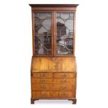 Late 19th century inlaid mahogany bureau bookcase with astragal glazed upper section above a fitted