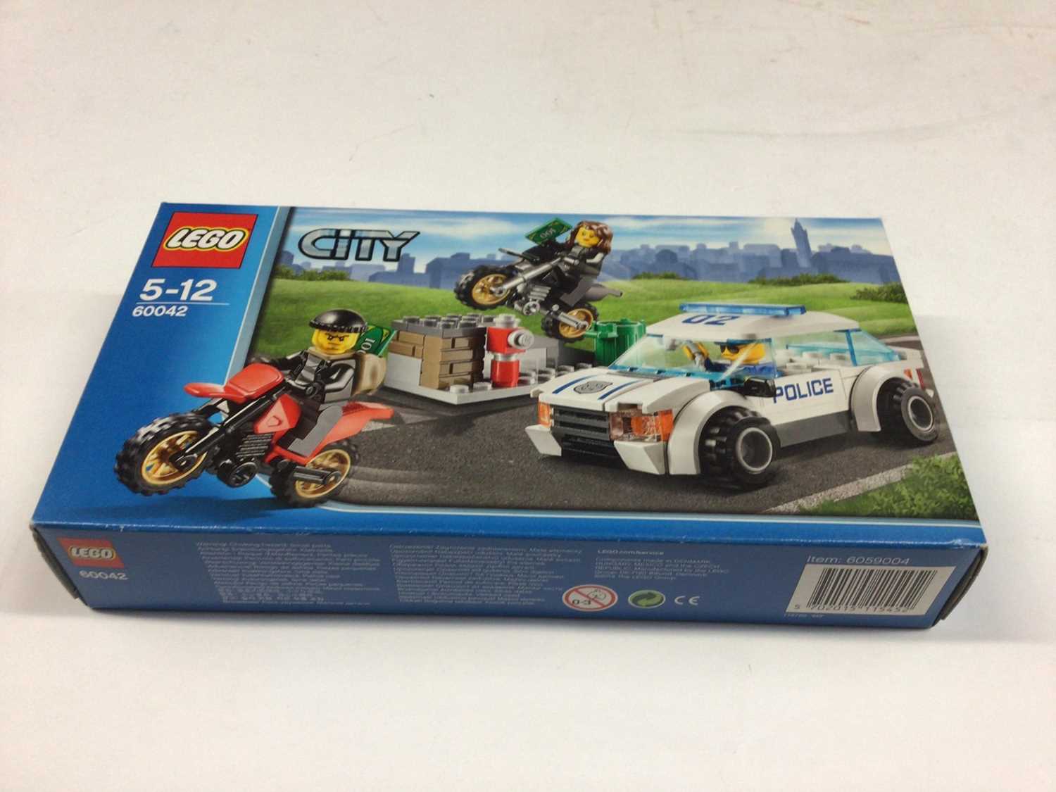 Lego 7286 Police Bundle, 3180 Tank Truck, 7991 Carbarge Truck, 7044 Coastguard Helicopter, 60042 Cit - Image 3 of 10