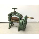 Unusual early 20th century leather rolling machine