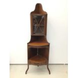 19th century inlaid mahogany corner cupboard, standing on bowfronted base, adapted from a corner was