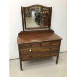 1930s mahogany dressing chest with mirrored back and two short and two long drawers below