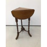 Victorian walnut triangular drop leaf table, on ring turned tripod supports, 39cm wide