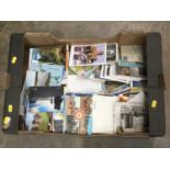 One box containing a large box of assorted postcards