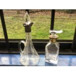 Silver mounted tapered glass spirit decanter, together with a silver gilt mounted glass scent bottle