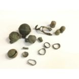 Group of metal detecting finds to include crotal bells, thimbles and rings