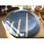 Large Studio pottery charger with white flashes on a blue ground