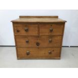 Victorian pine chest of two short and two long drawers with bun handles and ledge back, 86cm wide