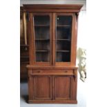 Late Victorian mahogany two height bookcase with glazed doors above enclosing three adjustable shelv