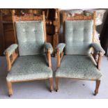 Pair of Edwardian deep armchairs