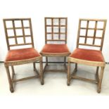 Three Heals limed oak 'Tilden' chairs, each with drop-in seats and makers plaques, together with a s