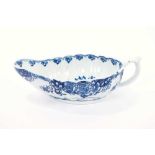 Lowestoft sauceboat, of flat bottomed form with reeded sides, the interior printed in blue with a 'd