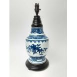 Chinese Qing period blue and white porcelain vase, painted with pomegranates, cut down and converted