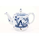 Lowestoft teapot and cover, of barrel shaped with an acorn finial, painted in blue with outsized flo