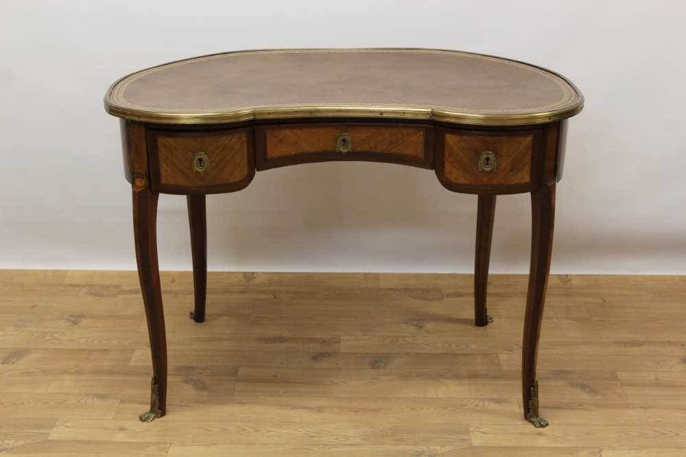19th century Continental mahogany and satinwood brass mounted kidney shaped desk