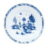 Lowestoft plate, painted in blue with a chinaman crossing a bridge with a fishing rod, a bird in fli