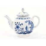 Lowestoft teapot, of globular form with a curved spout and button finial, painted in blue with flowe