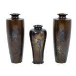 Pair of Japanese bronze and metal inlaid vases together with another smaller