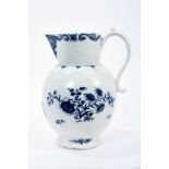 Lowestoft jug, of large size, the neck moulded with flowers and leaves, lappets and florets around t