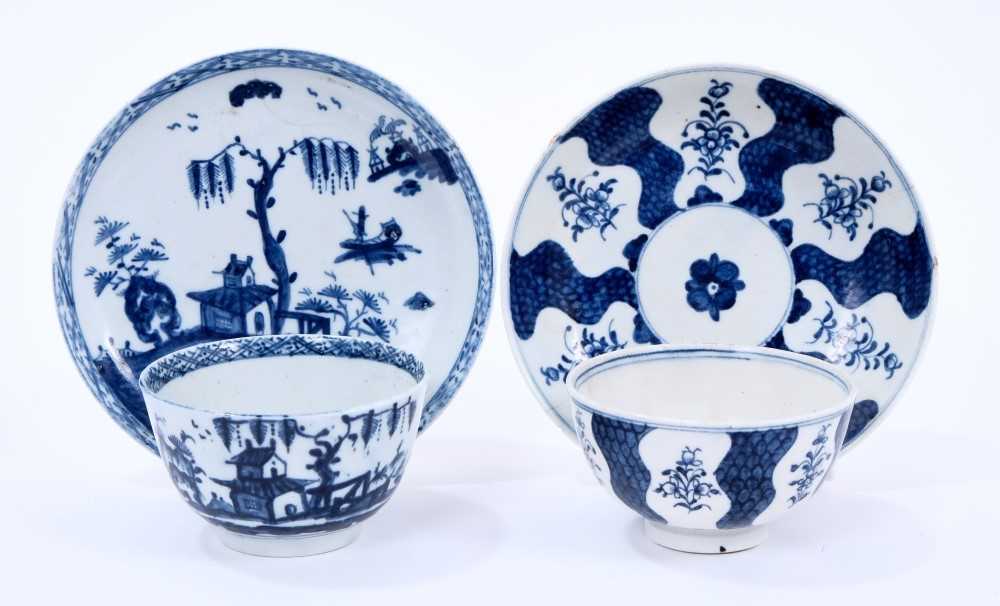 Two sets of Lowestoft tea bowls and saucers, the first painted in blue with the Robert Browne patter