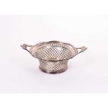 Edwardian silver two handled bonbon dish of tapered circular form, with pierced decoration, (Sheffie
