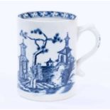 Lowestoft mug, of small cylindrical form with a scrolled handle, printed in blue with a Chinese rive