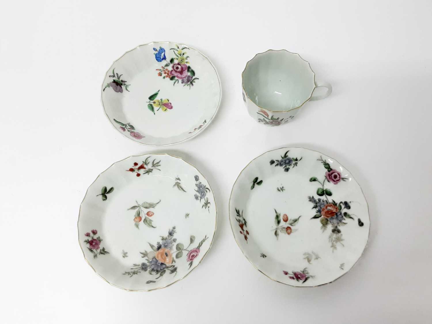 A Worcester flower painted faceted coffee cup and three saucers, circa 1770 - Image 2 of 3
