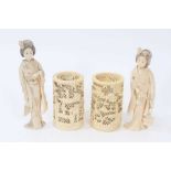 Pair of Japanese carved ivory figures of geisha and pair of pierced ivory brush pots