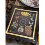 Unusual framed display of Victorian objects, including beadwork purses, buckles, brooches and specta