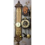 Georgian style rise-and-fall clock, lantern clock and a Black Forest wall clock
