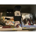 Ladies watch in box together with bottle openers, knives and sundries