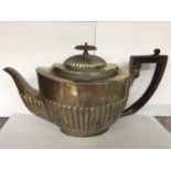 Victorian silver teapot of half fluted form with angular ebony handle. Approx 20oz