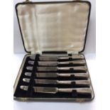 Set of six silver handled tea knives with stainless steel blades, in a fitted case