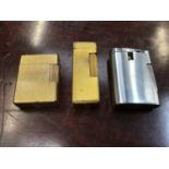 Vintage Dunhill gold plated pocket lighter, Dupont pocket lighter and a Ronson lighter (3)