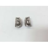 Pair 18ct white gold diamond set screw back earrings
