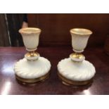 Pair of Royal Worcester gilt candlesticks, model number 1328, 10.5cm high