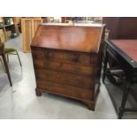 Good quality Georgian-style yew bureau with fall flap, fitted interior , arrangement of drawers belo