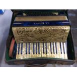 Vintage La Divina accordion in case and records