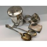 Group of silver and white metal items