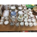 Large quantity of assorted teaware to include cups, saucers and trays