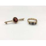 9ct gold sapphire and diamond ring and 9ct gold bar brooch