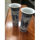 Pair of 19th Century Chinese blue and white porcelain cylinderical vases with figure decoration