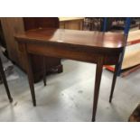 George III mahogany D end card table with fold over top and baize lined interior on square taper leg